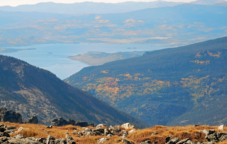 Lake Granby surrounded by fall colors, as seen from near the Continental Divide