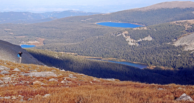 Suzy looking out at Long Lake, Left hand Reservoir, and the Brainard Lake Recreational Area