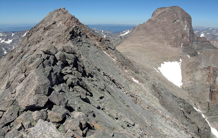 Looking at the exposed upper ridge of Mount Meeker towards the summit block