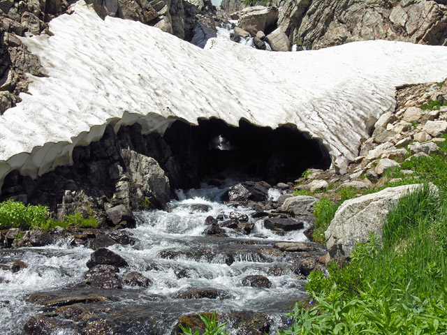 Snow bridge over the stream running down from Bluebird Lake