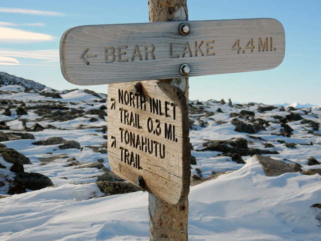 Trail junction sign in the Flattop Mountain summit area