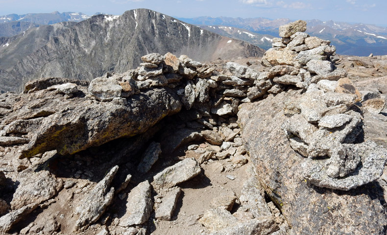 Fairchild Mountain summit windbreak with Ypsilon Mtn in the background