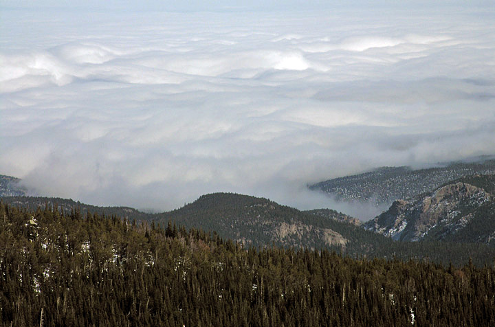 Telephoto shot of low clouds covering the Colorado Front Range foothills