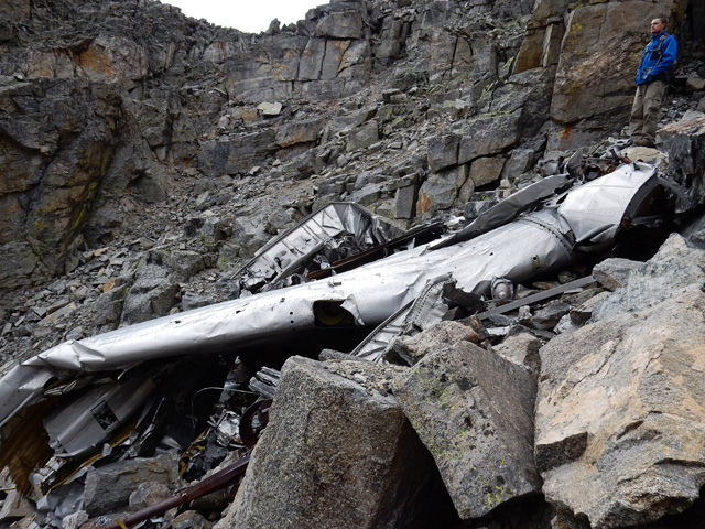 Another shot of Steve checking out wreckage in Airplane Gully during Navajo Peak Ascent