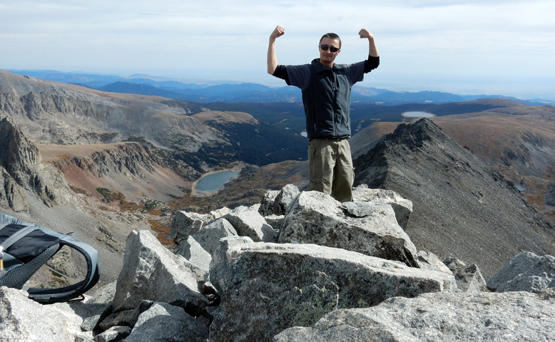 Steve giving the victory pose on the summit of Navajo Peak