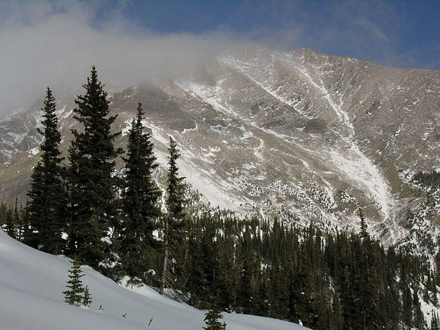 Small Cloud rolling in on the Mount Meeker's summit, Wild Basin, RNMP