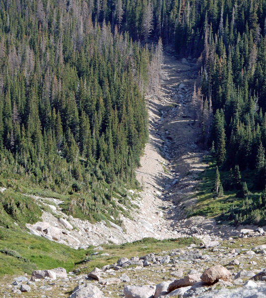 Looking down at erosion at the western head of Boulder Brook