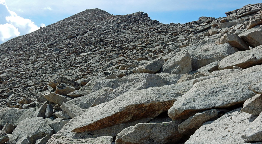 Looking up at the last 500 vertical feet of the North Ridge to the summit of Storm Peak