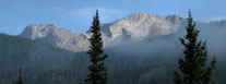 Early morning view of Longs Peak and Mount Meeker with fading mist