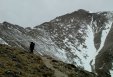 Suzy, at around 12,000 feet, ascending Mount Princeton via the East Slopes Route on an extremely gloomy winter day