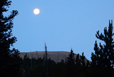 Near full moon over Copeland Mountain in dawn's early light