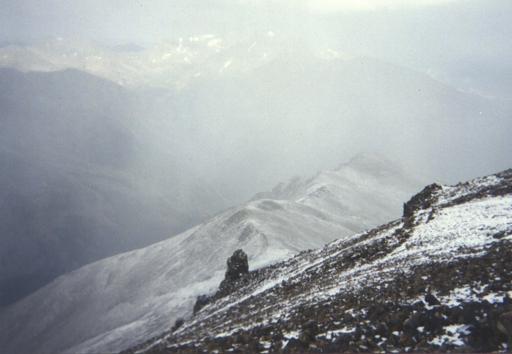 Late summer afternoon snow storm on top of Mt Elbert