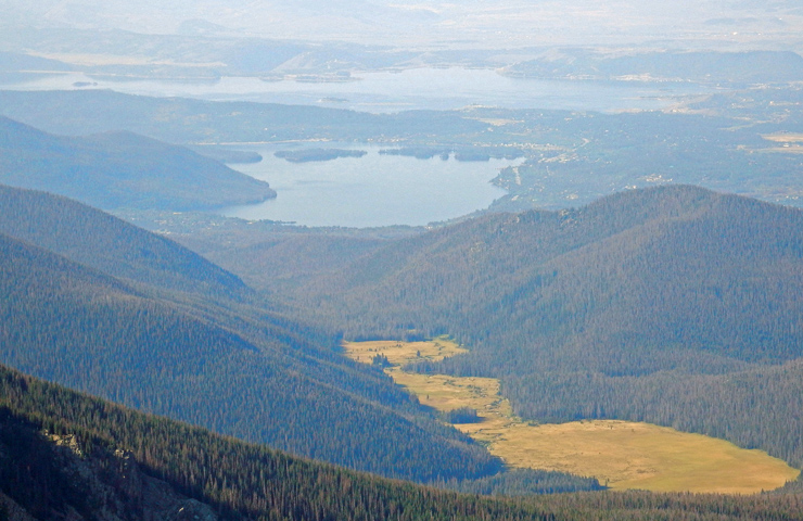 Smoky view of Shadow Mountain Lake and Lake Granby from the Mount Ida Trail