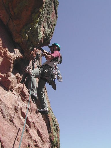 Ron Olsen preparing for the crux on Pitch 5 of Anthill Direct, Red Garden Wall, Eldorado Canyon, Boulder, Colorado