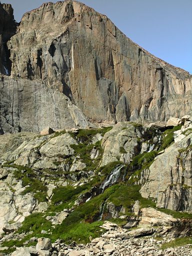 View of the Diamond Wall from Chasm Meadow with mini waterfall in the forground, Rocky Mountain National Park, Colorado