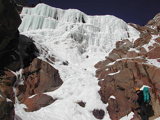 Ben, standing below a frozen Silverplume Falls, at Silverplume, Colorado