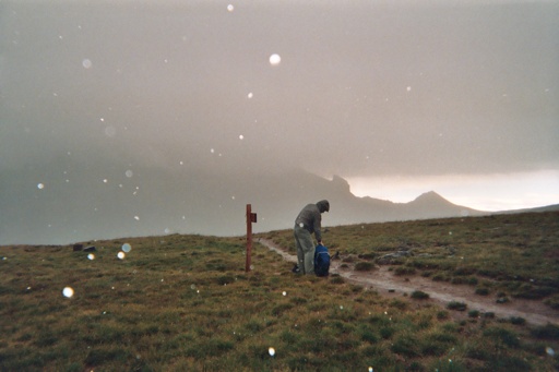 Uncompahgre dissapearing into a late summer / early winter storm.