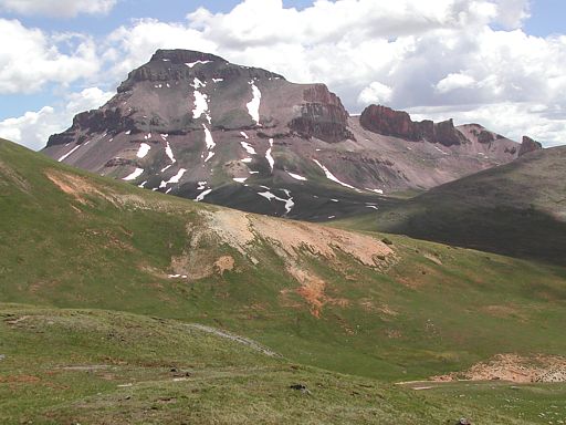 Uncompahgre Peak looking through the pass with the lower southeast slopes of Matterhorn Peak on the left.