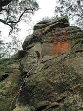 Mark Buman rap jumping the Big Banana Buttress
        Monkeyface Cliffs, NSW, Australia