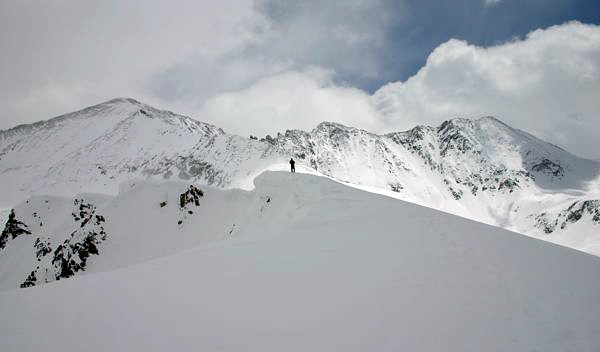 a Ben photo of myself standing in front of Atlantic Peak, Fletcher Mountain, and Drift Peak