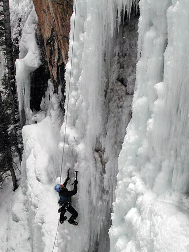 Climber on crux column, Dead Ringer, Five Finger Wall, Ouray Ice Park, Ouray, Colorado