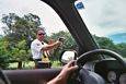 Policia posing for picture after I was caught speeding on our last day in Costa Rica while driving back to San Jose