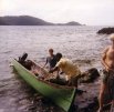 Standing on the south side of the north Three Sisters island, or islands, looking back at the Panamanian from Portobelo who brought us out, as he tends the boat