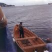 A Panamanian law enforcement officer of some kind, heading out to somewhere in a small boat at Taboga Island, in the Gulf of Panama