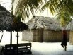 My hut at the Hotel San Blas, with a Kuna Indian woman passing by