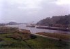 Ship exiting the Miraflores Locks, on the Pacific - south end of the Panama Canal, heading south into the Pacific Gulf of Panama