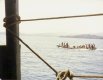 Passing a small boat full of waving people, on our way to the San Blas Islands